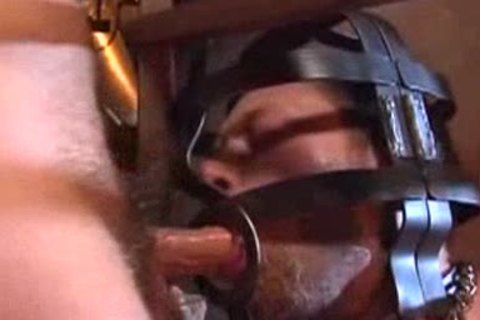 Caged lad and a 3 some