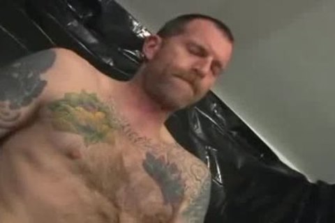 Two sweet Tattooed Leather Daddies
