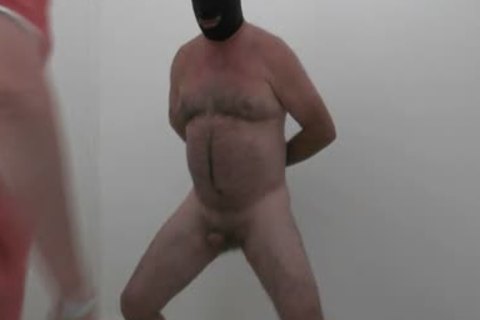 undresses naked And Requests Balls To Be Kicked