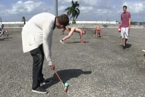 Frat men outdoors hazing ritual